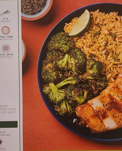 Red pepper jam pork chops with broccoli and scallion rice