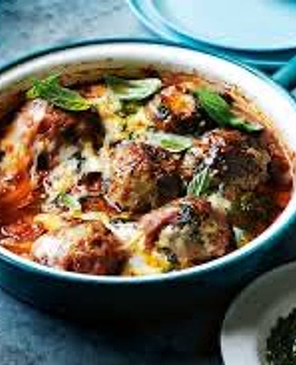 Oven-roasted meatballs with pesto and mozzarella