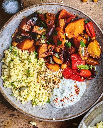 Spicy roots and millet bowl with herby yoghurt dressing 