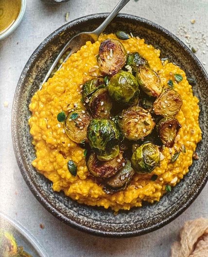 Cheesy squash millet with miso Brussels sprouts 
