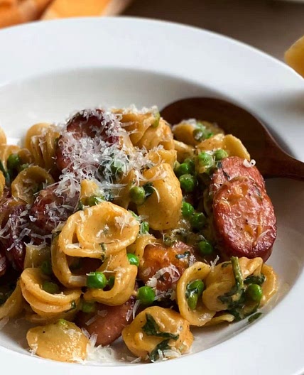 Creamy orecchiette with sausage and peas