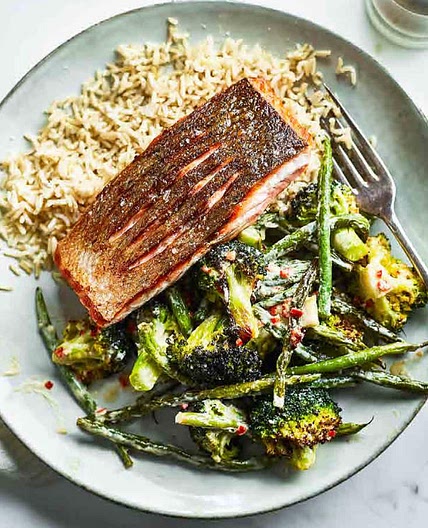 Salmon with roast broccoli and beans with tahini dressing