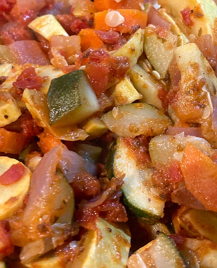 Squash, carrots, tomatoes, and onions