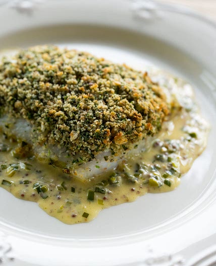 Herb-baked pollock with leek and mustard sauce recipe