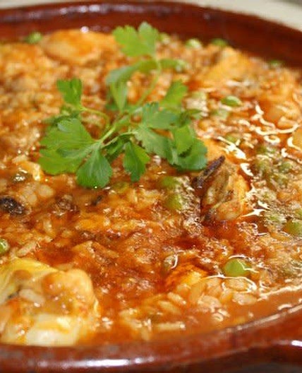 Arroz meloso de pollo y pimientos