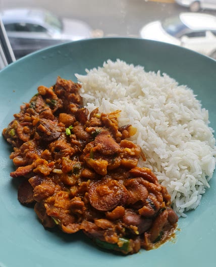 Fava beans and sausages with rice.