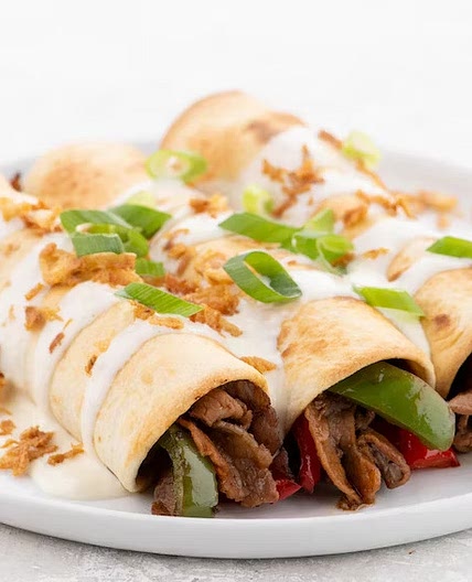 Philly Cheesesteak Enchiladas