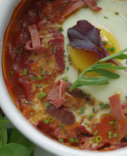 Fava bean stew topped with a baked egg