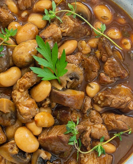 Braised pork with butter beans & mushrooms