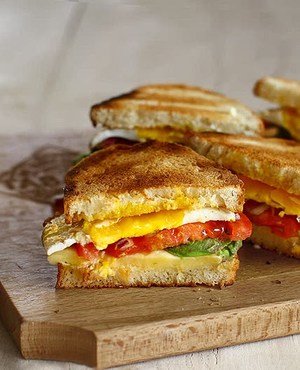 Warm sandwich with cheese egg and avocado 