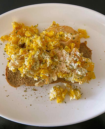 Breakfast toast with eggs and cottage cheese