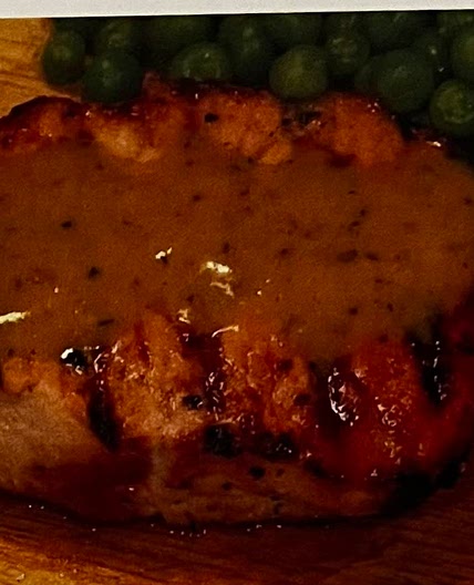 Pork chops with orange sauce 