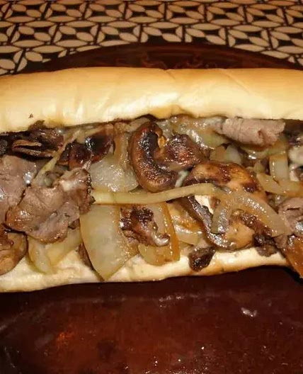 SLOW COOKER PHILLY CHEESE STEAK SANDWICHES