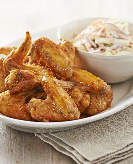 Crispy honey buffalo wings with blue cheese & celery slaw