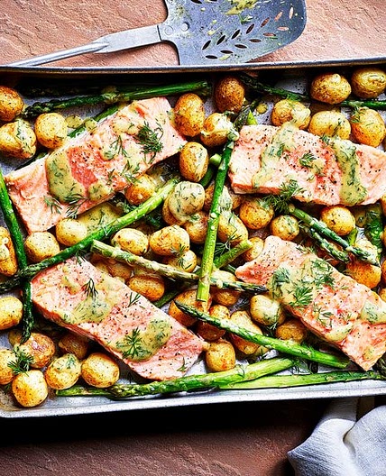 Sea trout, new potato and asparagus traybake with dill mustard sauce