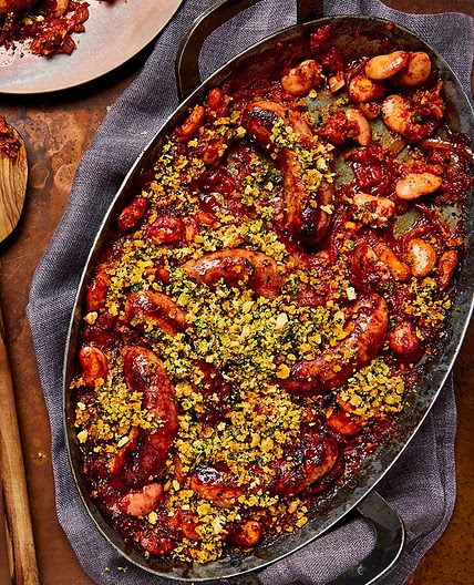 One-pot sausage casserole with garlic breadcrumbs