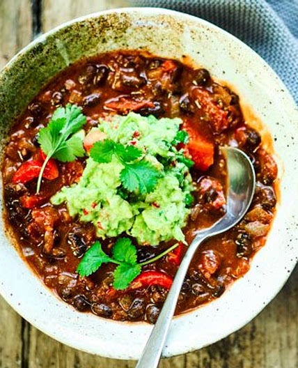Mexican bean soup with guacamole