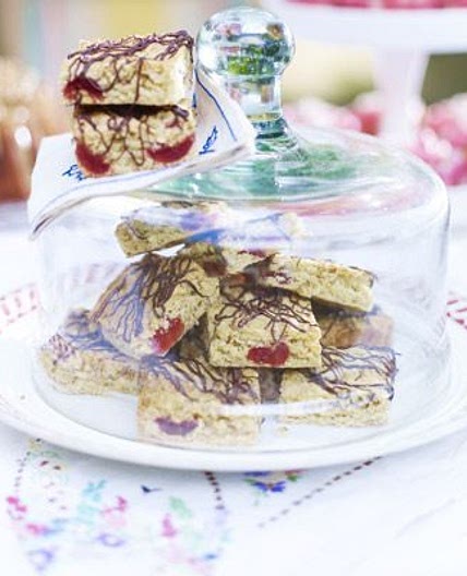 Cherry oat squares with chocolate drizzle