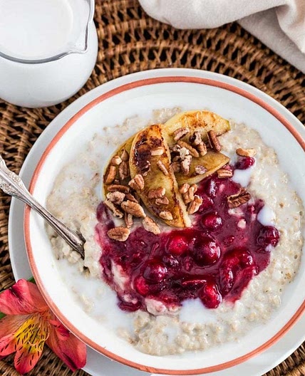 Christmas Oats Porridge with Cranberry Sauce, Apples and Pecans