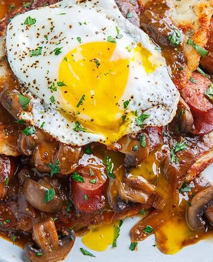 Boxty (Irish Potato Pancakes) With Bangers In A Guinness Mushroom And Onion Gravy
