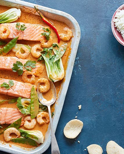 Fragrant coconut, salmon & prawn traybake