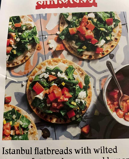 Istanbul flatbread with wilted greens, feta, and preserved lemon