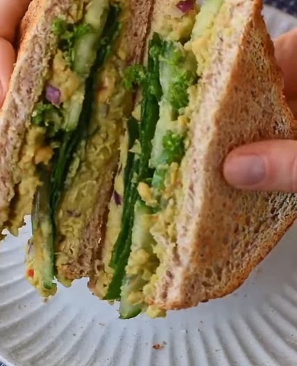 Smashed avocado chickpea cucumber sandwich