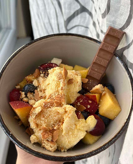 A perfect dessert - fruit salad with ice-cream