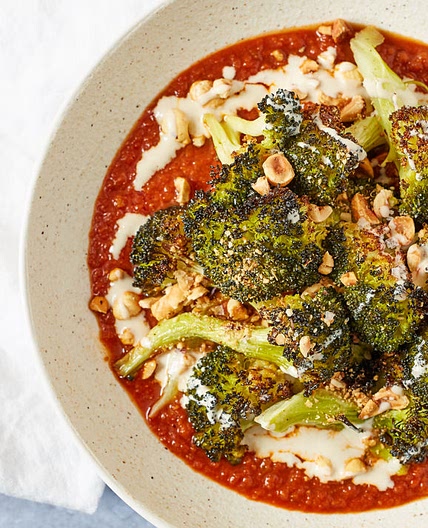 Roasted broccoli with hazelnut, tomato sauce and tahini