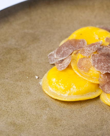 Egg yolk ravioli with truffle and Parmesan