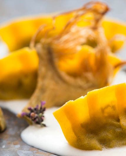 Mezzelune ravioli with artichokes, pecorino and thyme