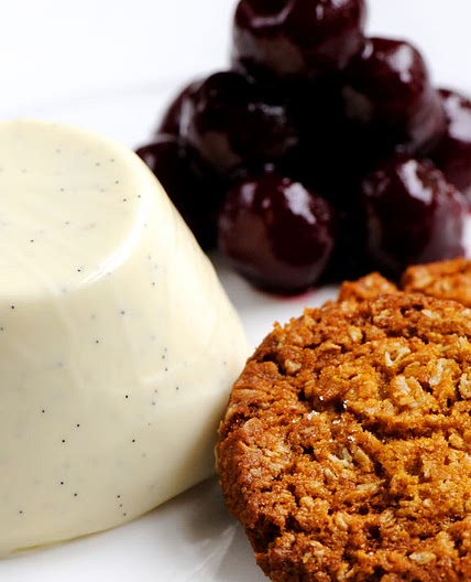 Cherries jubilee with vanilla and yoghurt panna cotta