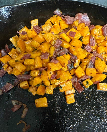 Sweet potato-bacon hash with avocado cream