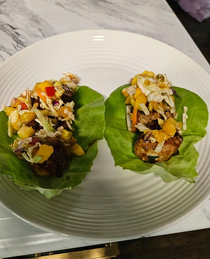 Asian Chicken Meatball Lettuce wraps with a mango slaw