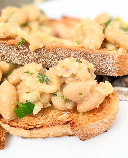 Silky smooth white beans with garlic + lemon