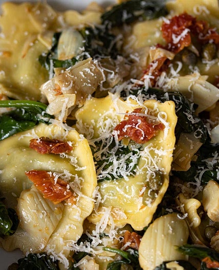 Ravioli with Artichokes Hearts, Capers, Sun-Dried Tomatoes, Spinach