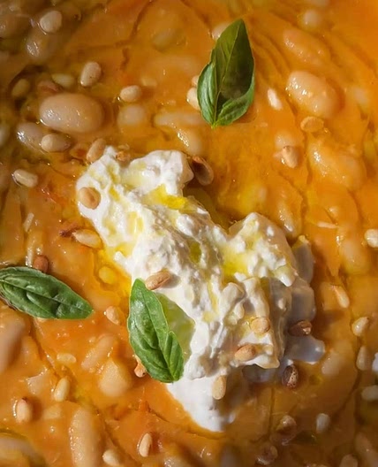 Braised summer tomatoes and cannellini beans
