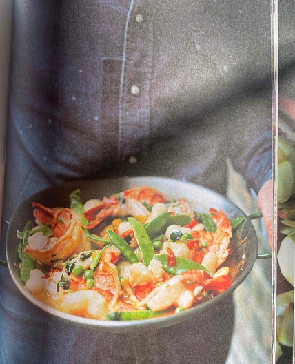 Pan cooked giant prawns with mangetouts, peas and butter beans 