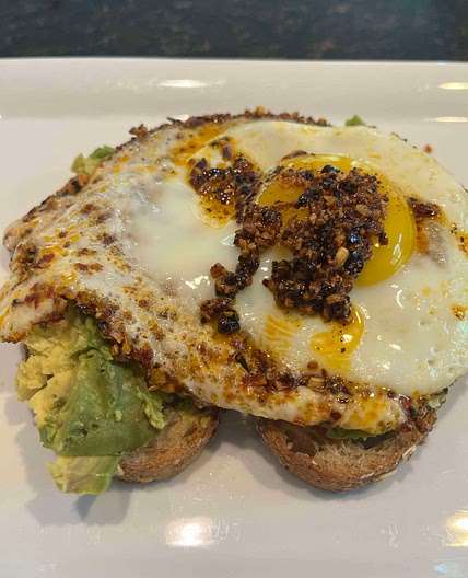 Avocado toast with chili-oil egg