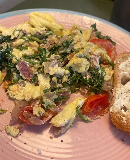 Arugula and Goat cheese breakfast scramble