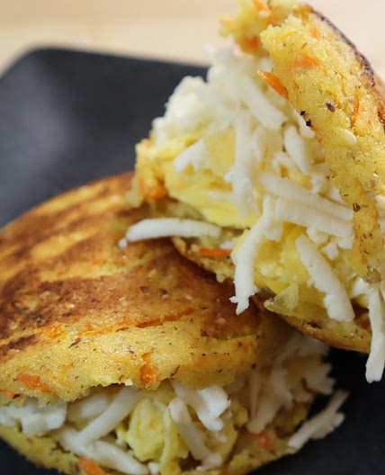 Arepas with carrots, eggs and cheese.