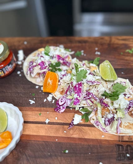 FISH TACOS WITH MANGO-CITRUS SLAW