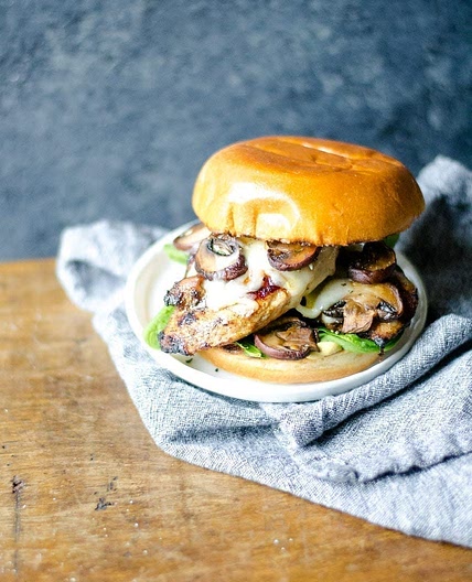 Spiced chicken sandwiches with mushrooms and swiss