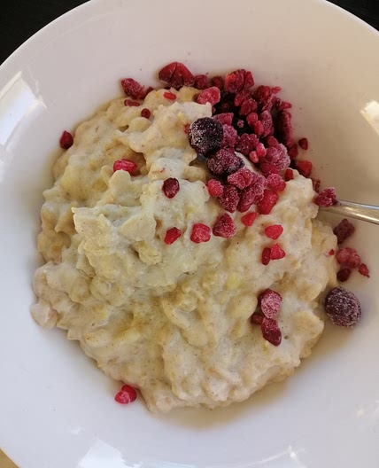 Stove top steel-cut oats with banana, cherries, and almonds