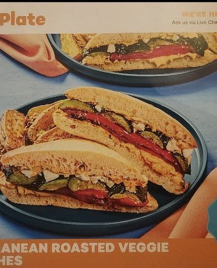 Mediterranean Roasted Veggie Sandwiches with feta, creamy hummus sauce, and lemon herb potato wedges