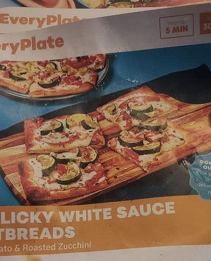 Garlicky White Sauce Flatbreads with tomato and roasted zucchini