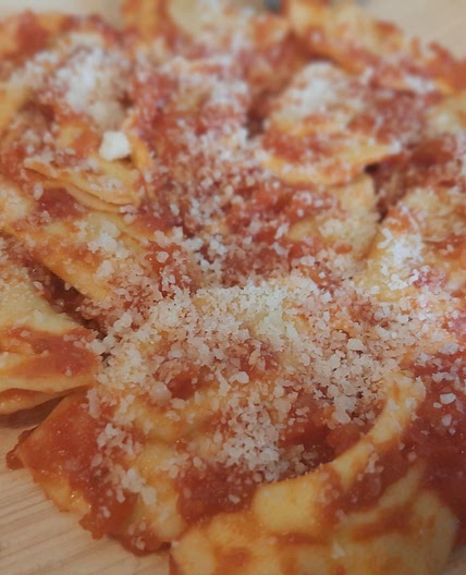 Ravioli di carne al sugo