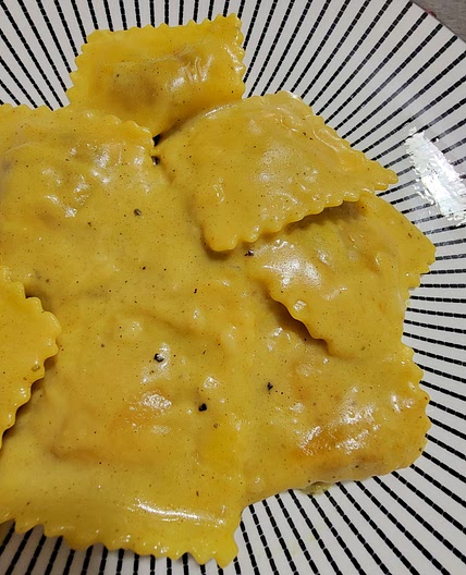 Butternut squash ravioli with a sage brown sugar butter cream sauce