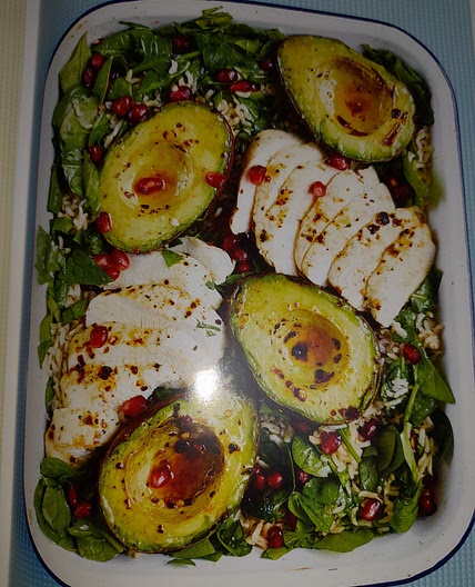 Avocado and chicken salad with pomegranates and brown rice