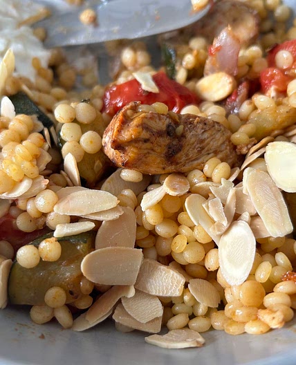 Honey & harissa chicken with giant couscous